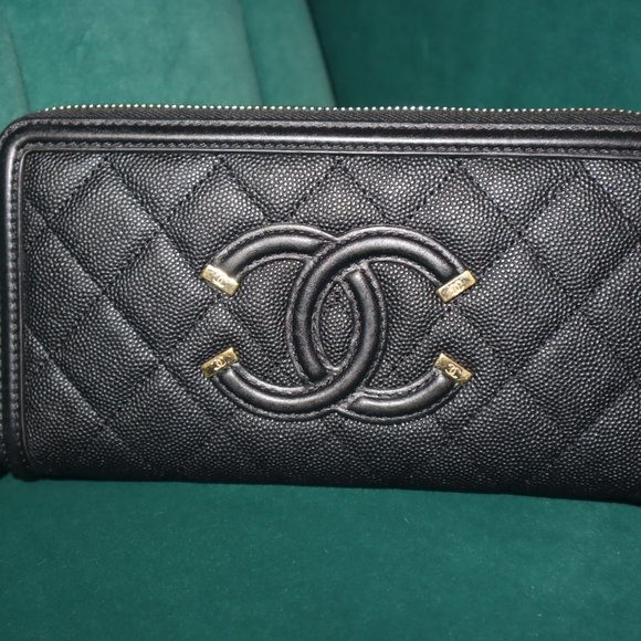 CHANEL Handbags - Chanel Caviar Quilted Filigree Zip Around Wallet Black